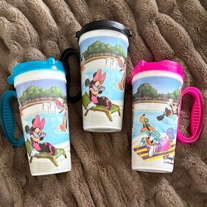Vintage Disney Parks Refillable Mugs with Blue, Black, and Pink Lids Set of 3